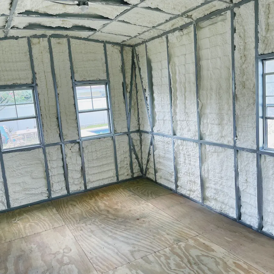 Closed-cell spray foam insulation applied to wall cavities in a residential project in Dunellen